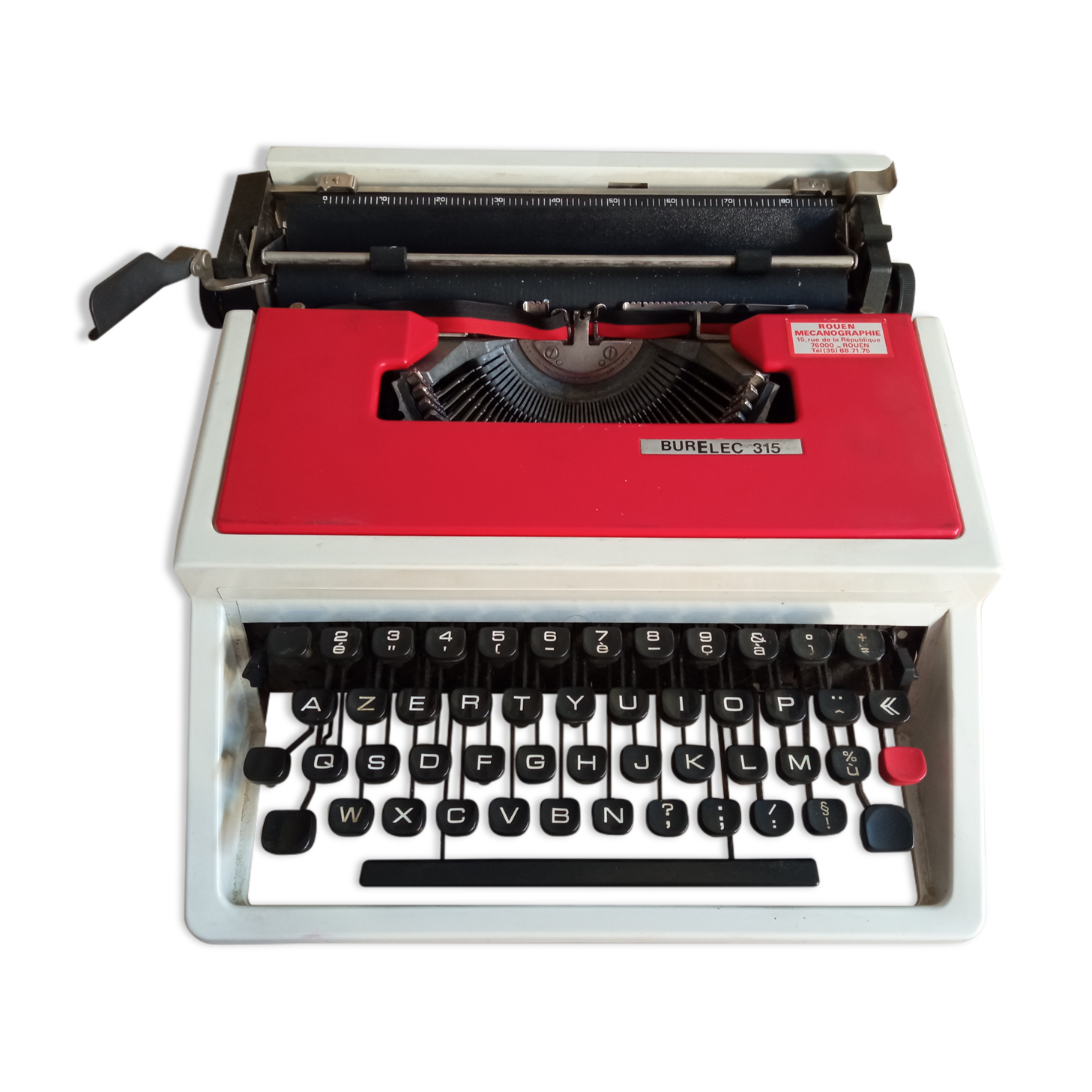 Typewriter "Burelec 315" made in Spain in red and white metal.