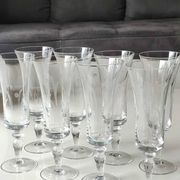 Set of 8 champagne flutes, flared neck. In crystal. Frosted plant motifs.