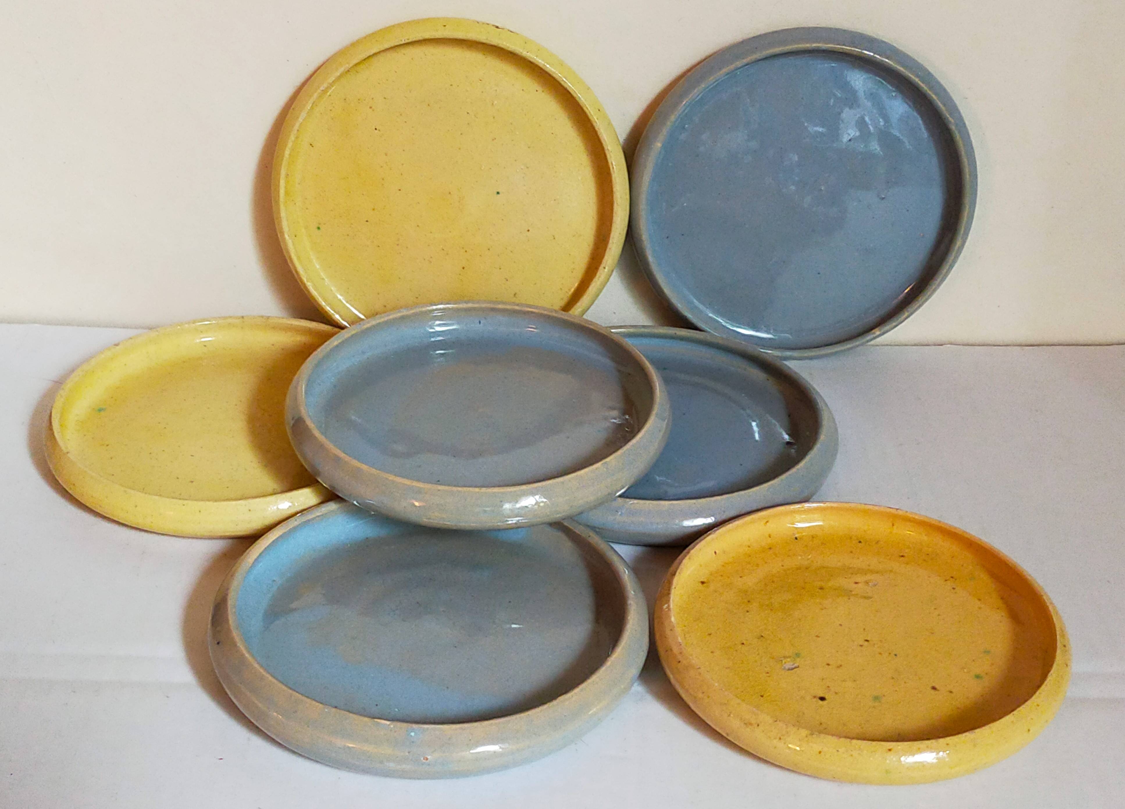 Seven vintage potter's sweet treat plates