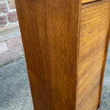 Sliding curtain binder cabinet