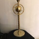 Brass lamp with removable ring around a globe