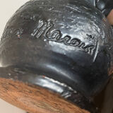 Black ceramic pitcher by Jean Marais