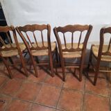 4 rustic farmhouse chairs made of wood and straw