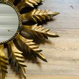 Miroir soleil métal doré