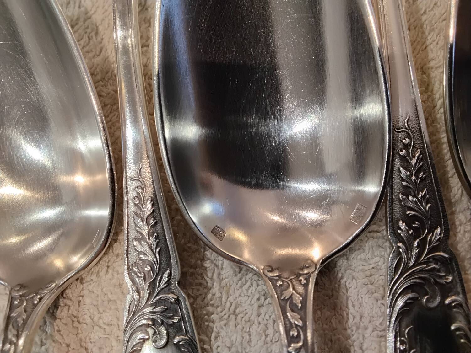 12 silver-plated metal dessert spoons, silversmith SFAM, rocaille design, 19.1 cm.