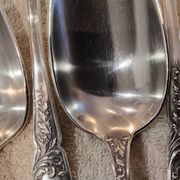 12 silver-plated metal dessert spoons, silversmith SFAM, rocaille design, 19.1 cm.