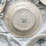 7 assiettes à dessert en terre de fer "Marguerite" faïencerie Nouvelle Givors