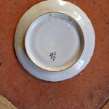 Old plate with coat of arms