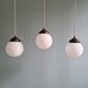 Art Deco trio of suspensions in white opaline, 1930s