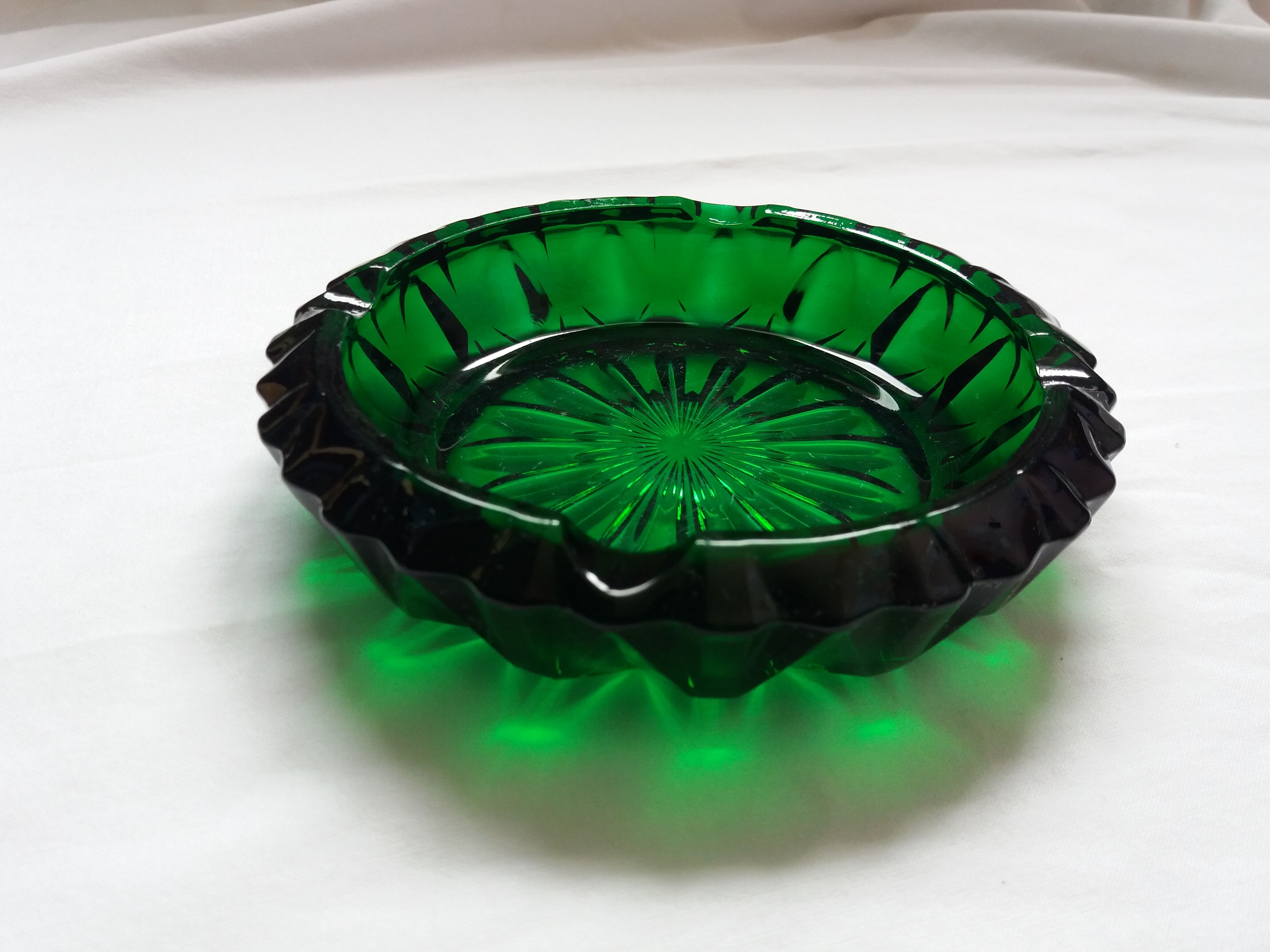 Green glass ashtray