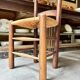 Provençal chair in dark wood and woven straw.