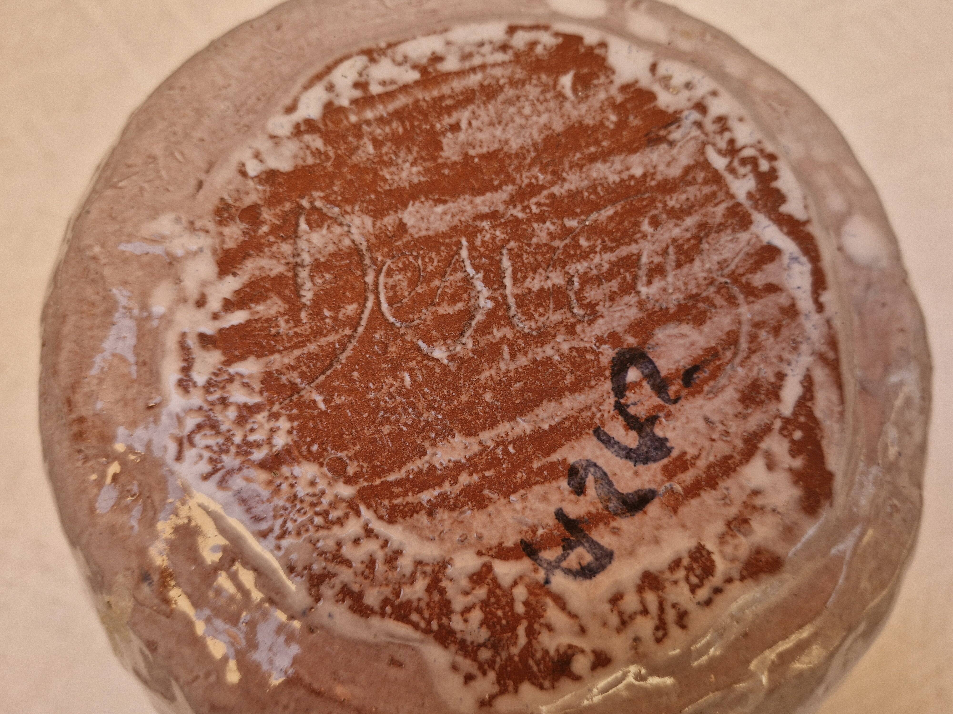 Old stamped glazed terracotta jug
