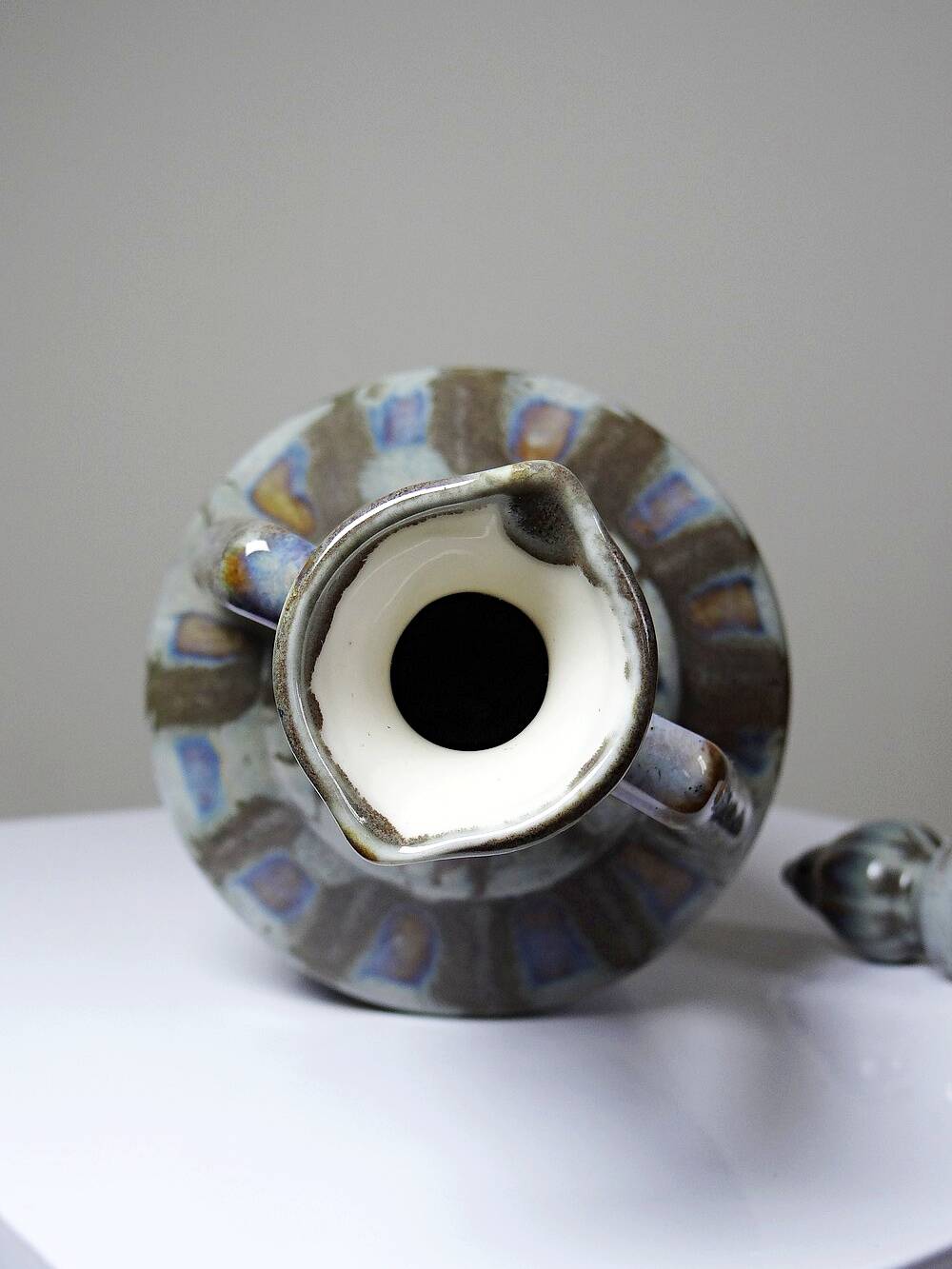 Vintage stoneware bottle with flamed glaze, France 1950-1970.