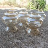 Set of 6 amber glass globes.