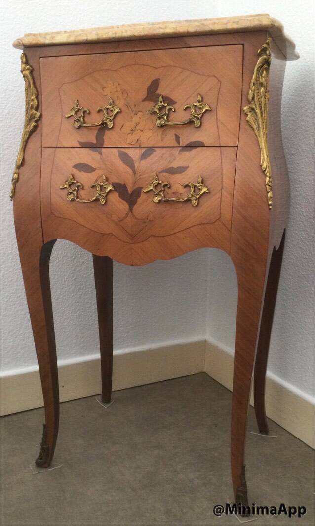 Pair of curved bedside tables in the Louis XV style with noble wood marquetry from the period.