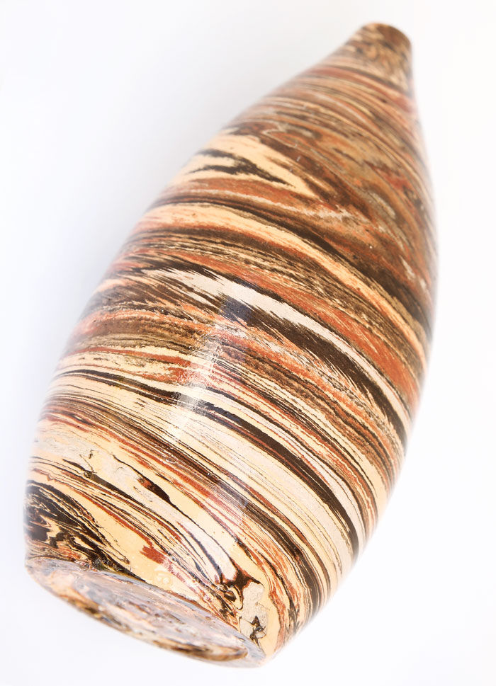 Sand, terracotta and brown soliflore vase in mixed earth