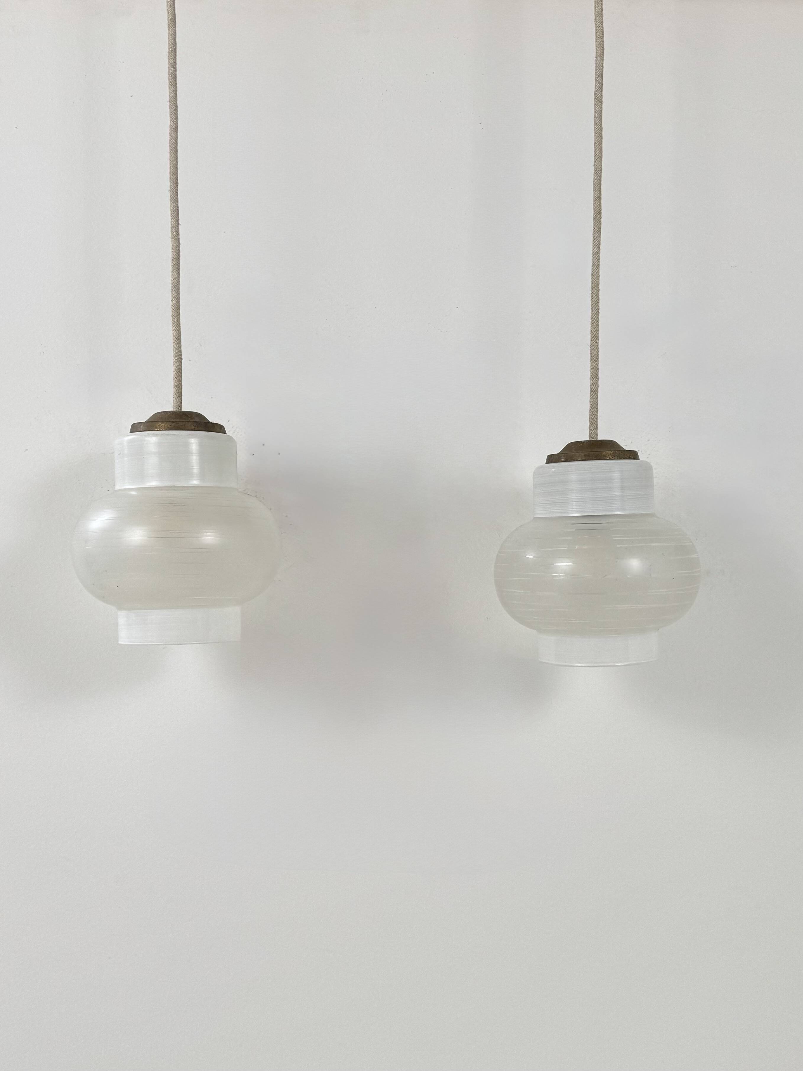 Pair of vintage pendant lights, blown white glass, France, 1970.