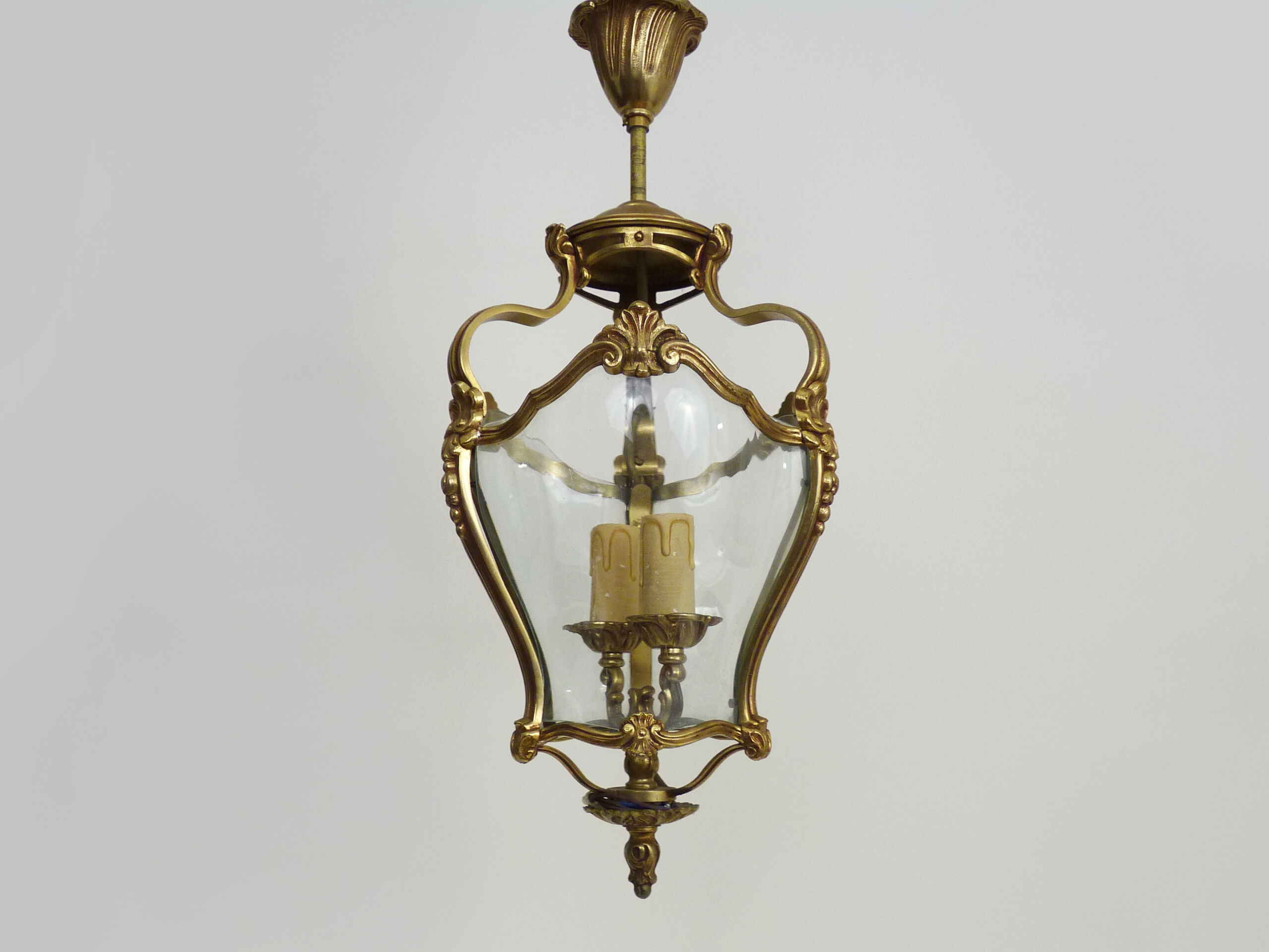 Old lantern with 3 faces, chandelier in gilded bronze and curved glass. Year 60