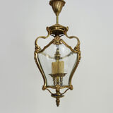 Old lantern with 3 faces, chandelier in gilded bronze and curved glass. Year 60