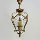Old lantern with 3 faces, chandelier in gilded bronze and curved glass. Year 60
