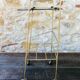 Vintage side table in brass and smoked glass, 1960