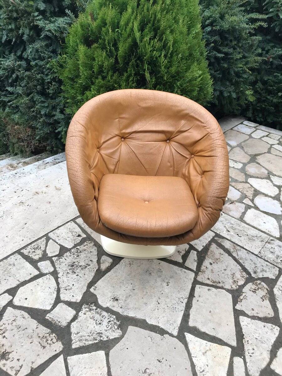 Brown tulip club chair in fibreglass resin and faux leather, France 1970s by Raphaël
