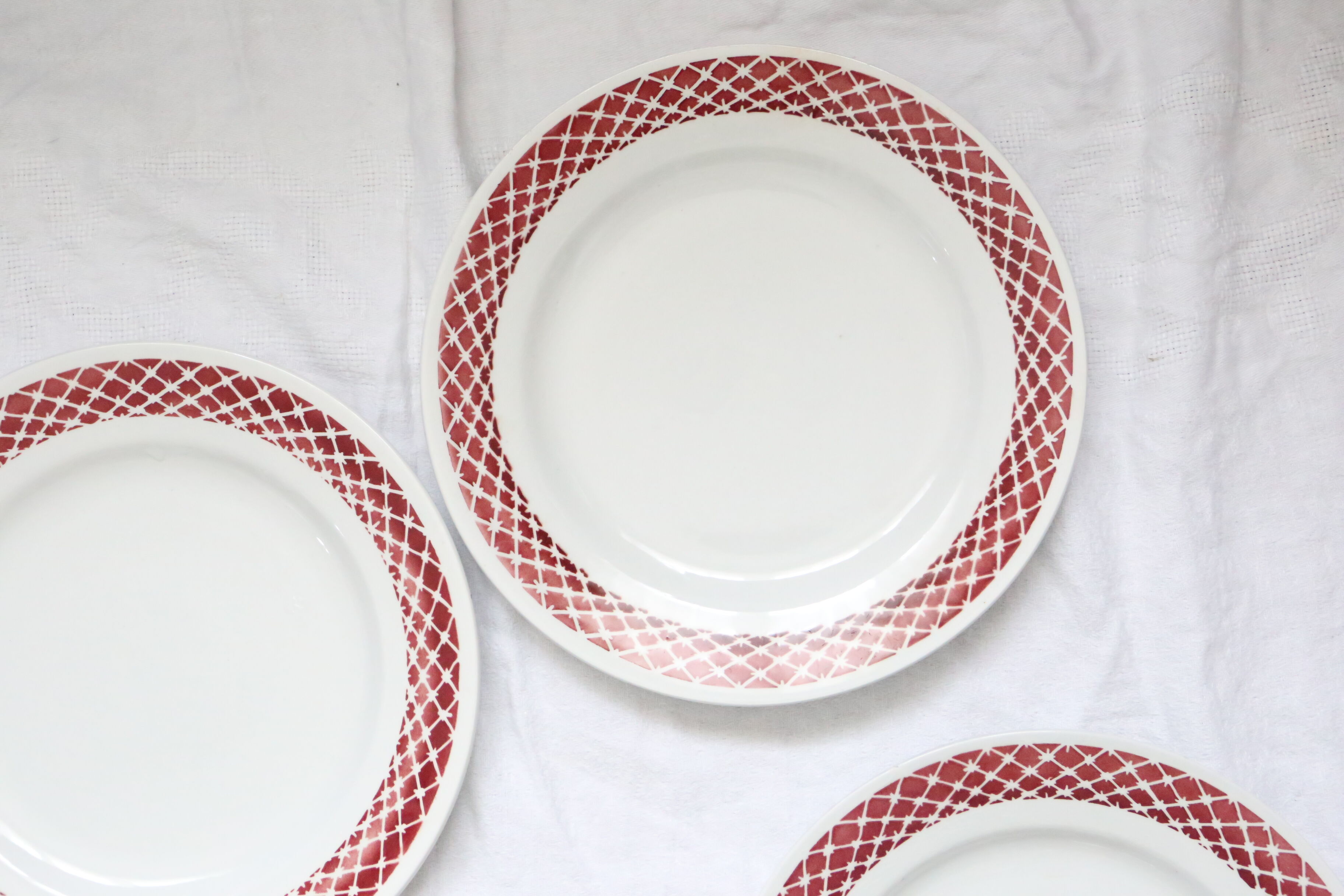 Set of 9 flat plates, geometric patterns, vintage