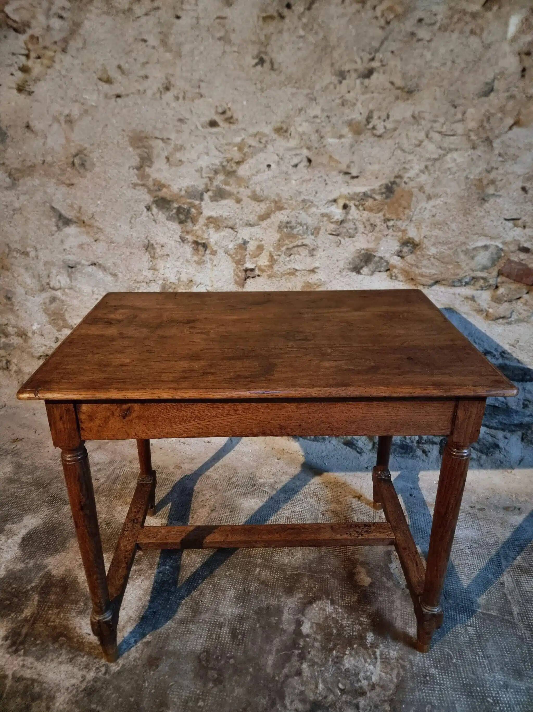 Antique French oak table, writing table from the early 19th century.