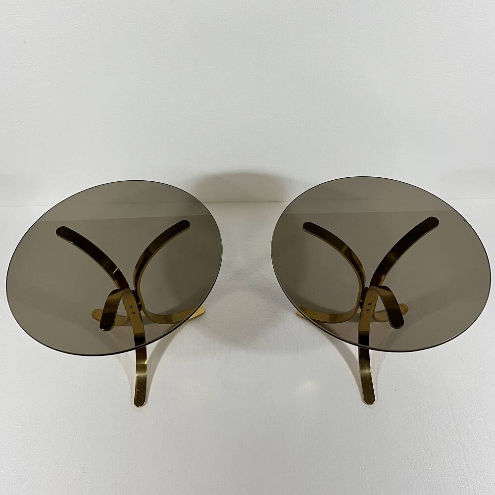 Brass and smoked glass side tables from the 1960s.