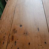 Coffee table with raw wood and a large drawer.