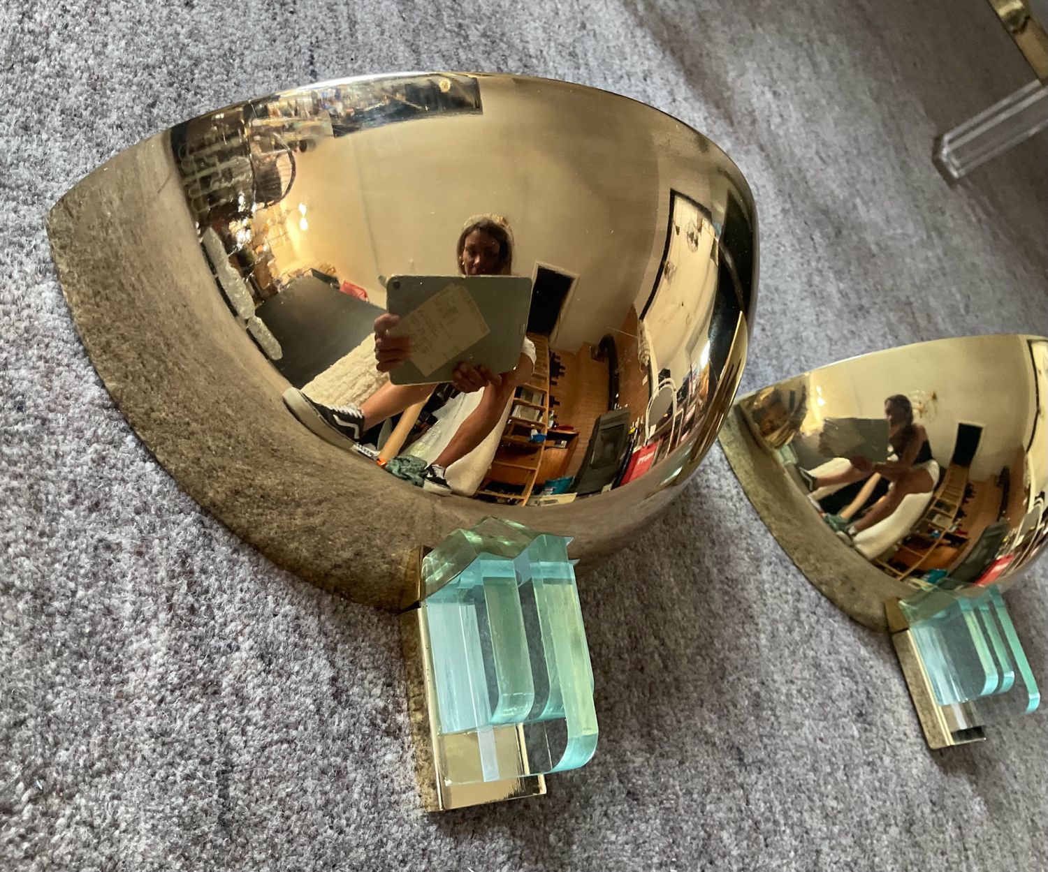 Pair of Hollywood Regency half-moon wall lamps in gilded metal and plexiglass