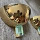 Pair of Hollywood Regency half-moon wall lamps in gilded metal and plexiglass