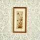 Vintage wood frame dried flowers under glass