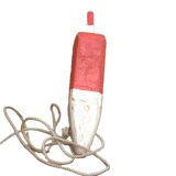 Old red and white wooden buoy