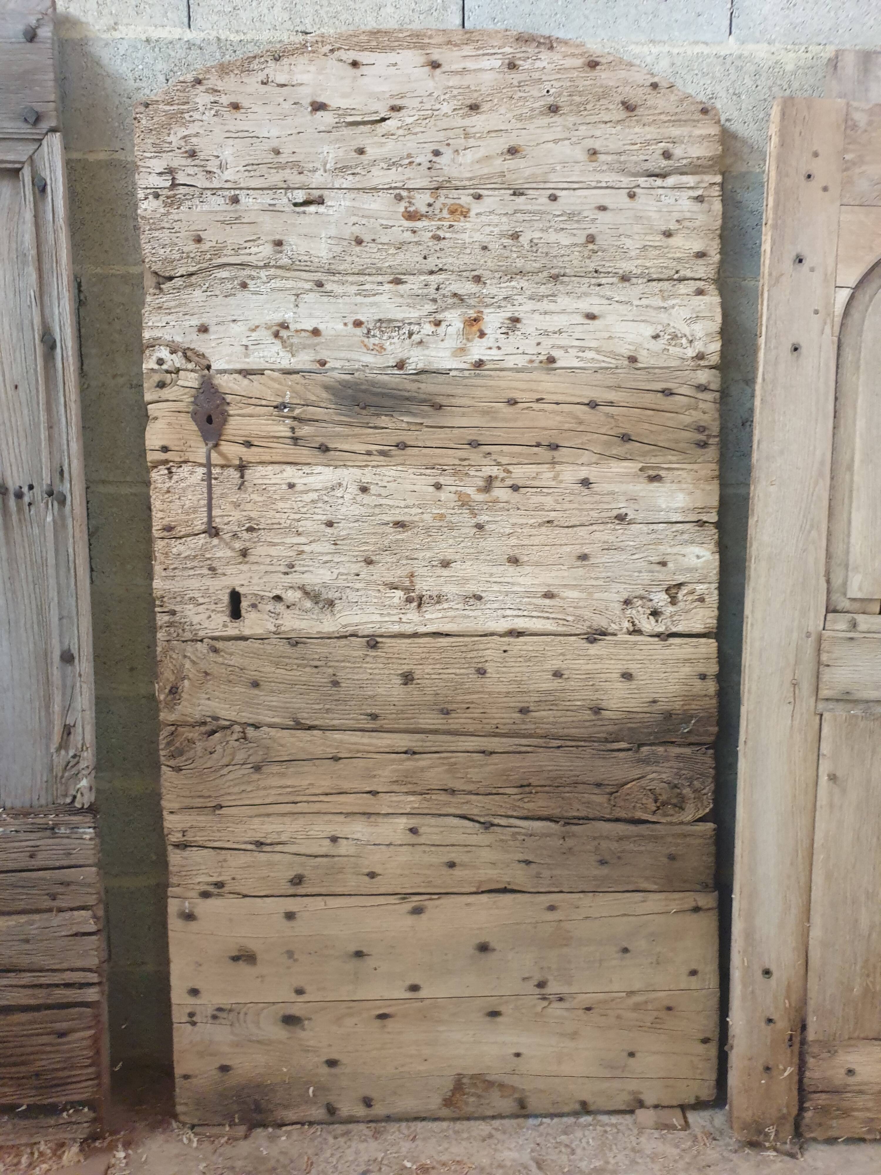 18th century studded chestnut door