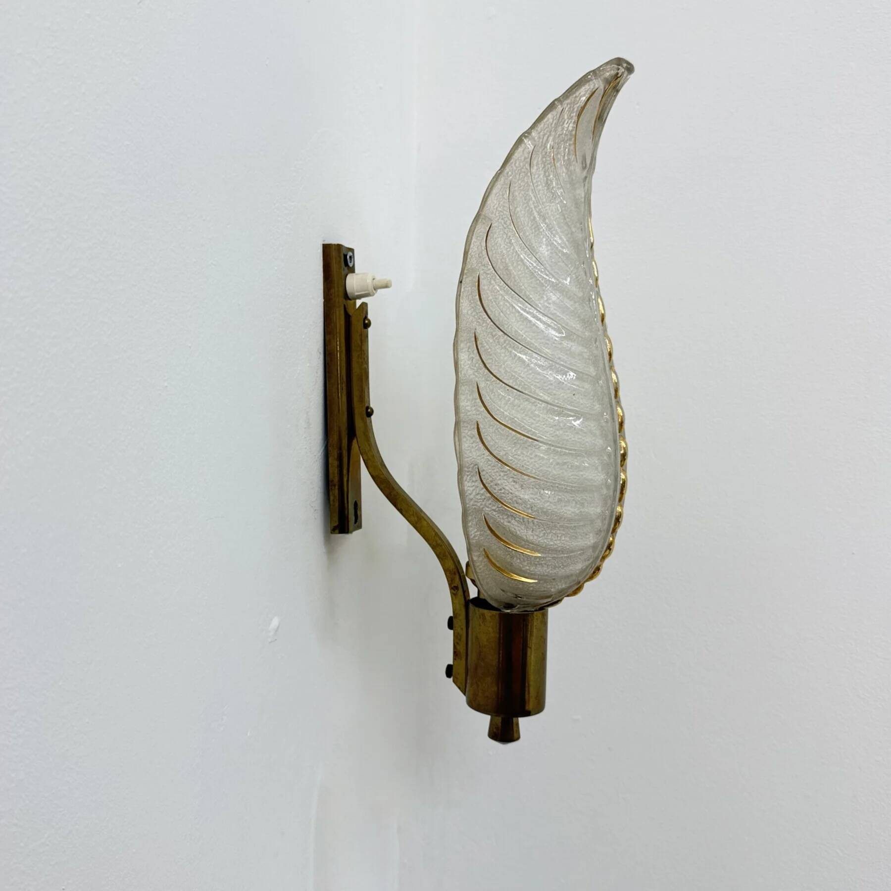 Art Deco brass and glass sconce by Ezan, France, 1940s