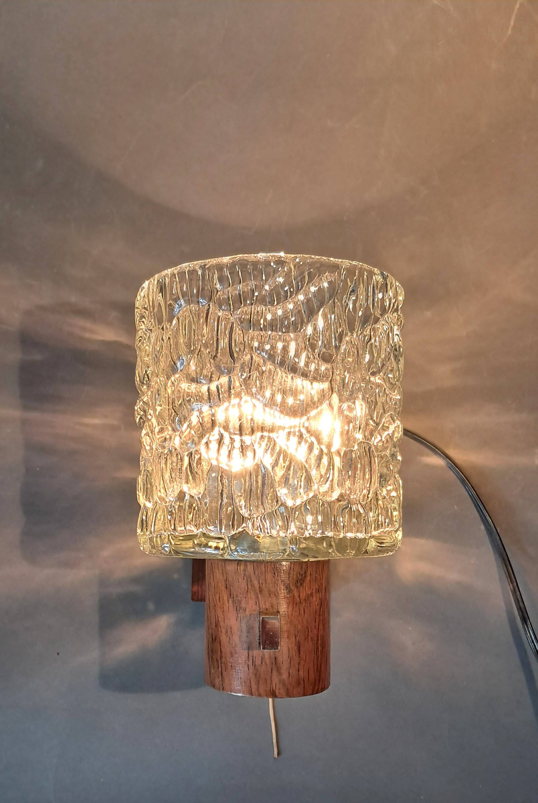 Scandinavian teak and chrome wall light from the 1960s.