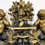 Antique 1800s black and gold mirror with cupid, France 1800s.