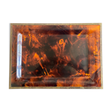 Plate of lucite scale and patinated brass