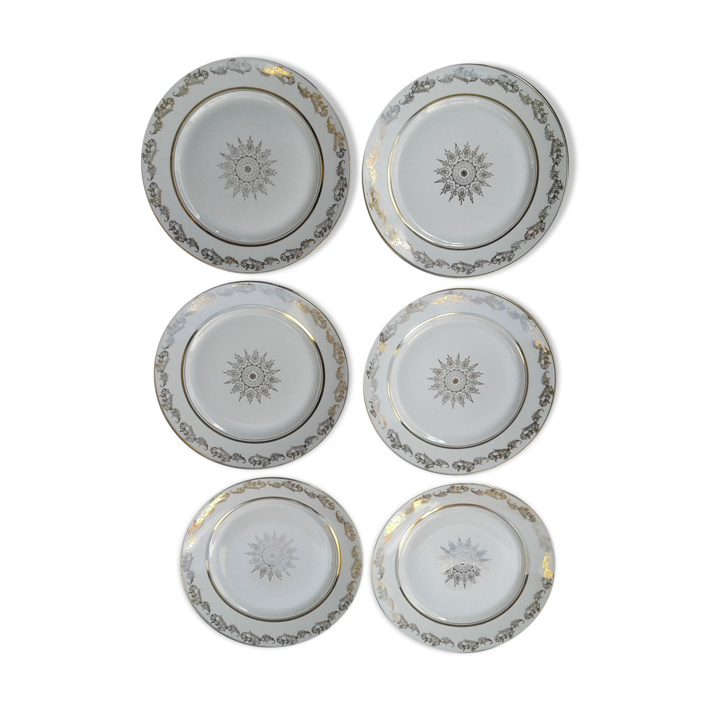 6 porcelain hollow plates, signed LJ & cie