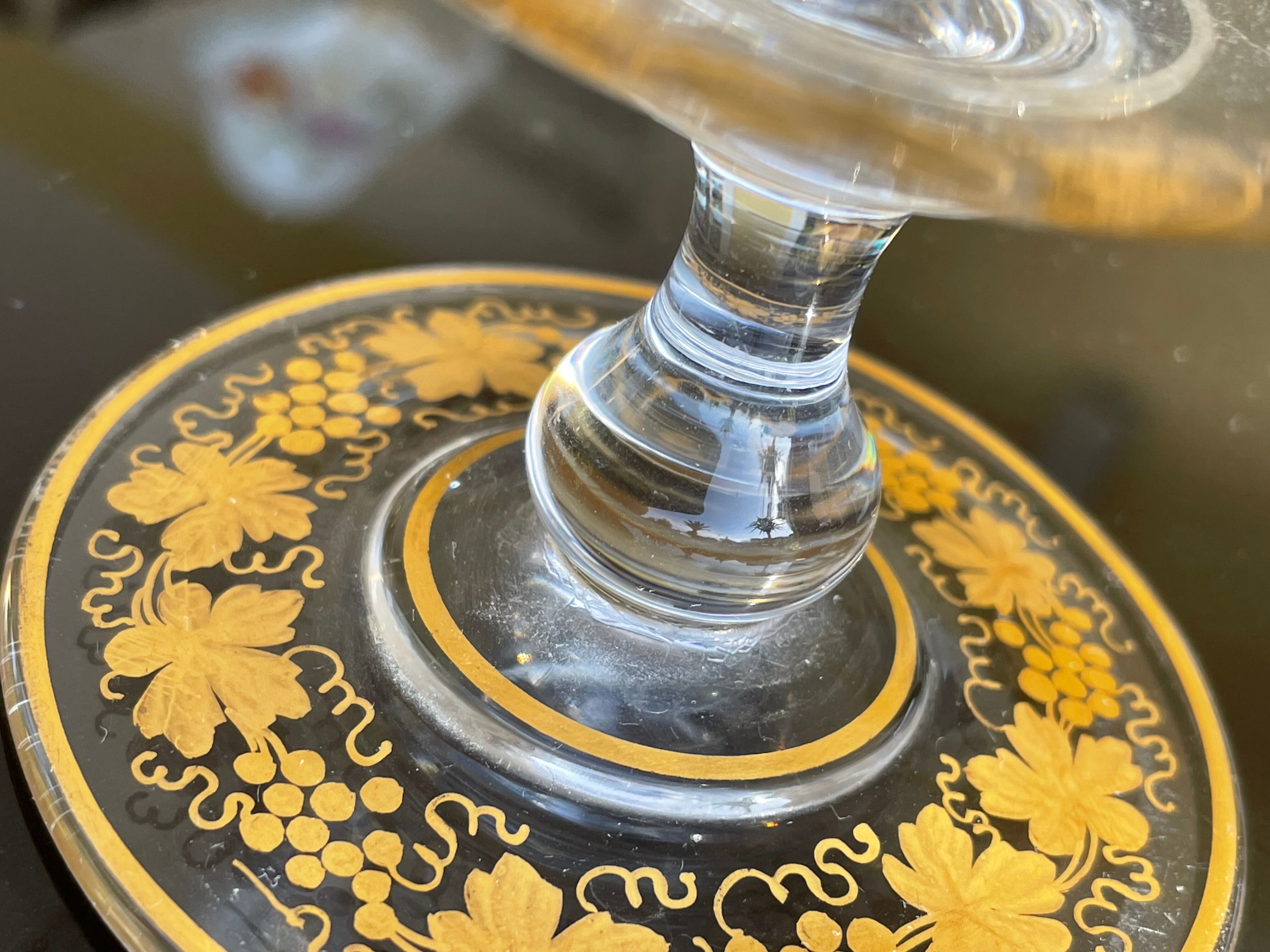 Glass cup decorated with golden vine decoration