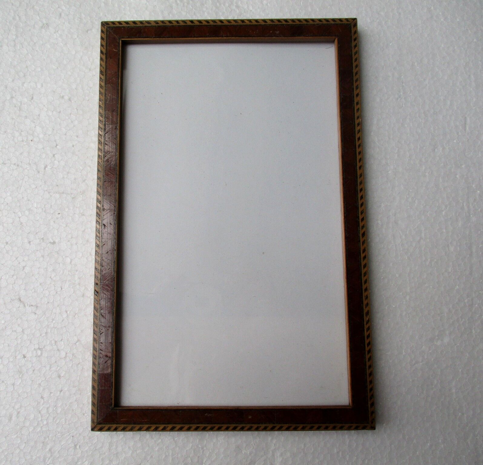 Old wall frame, wood marquetry