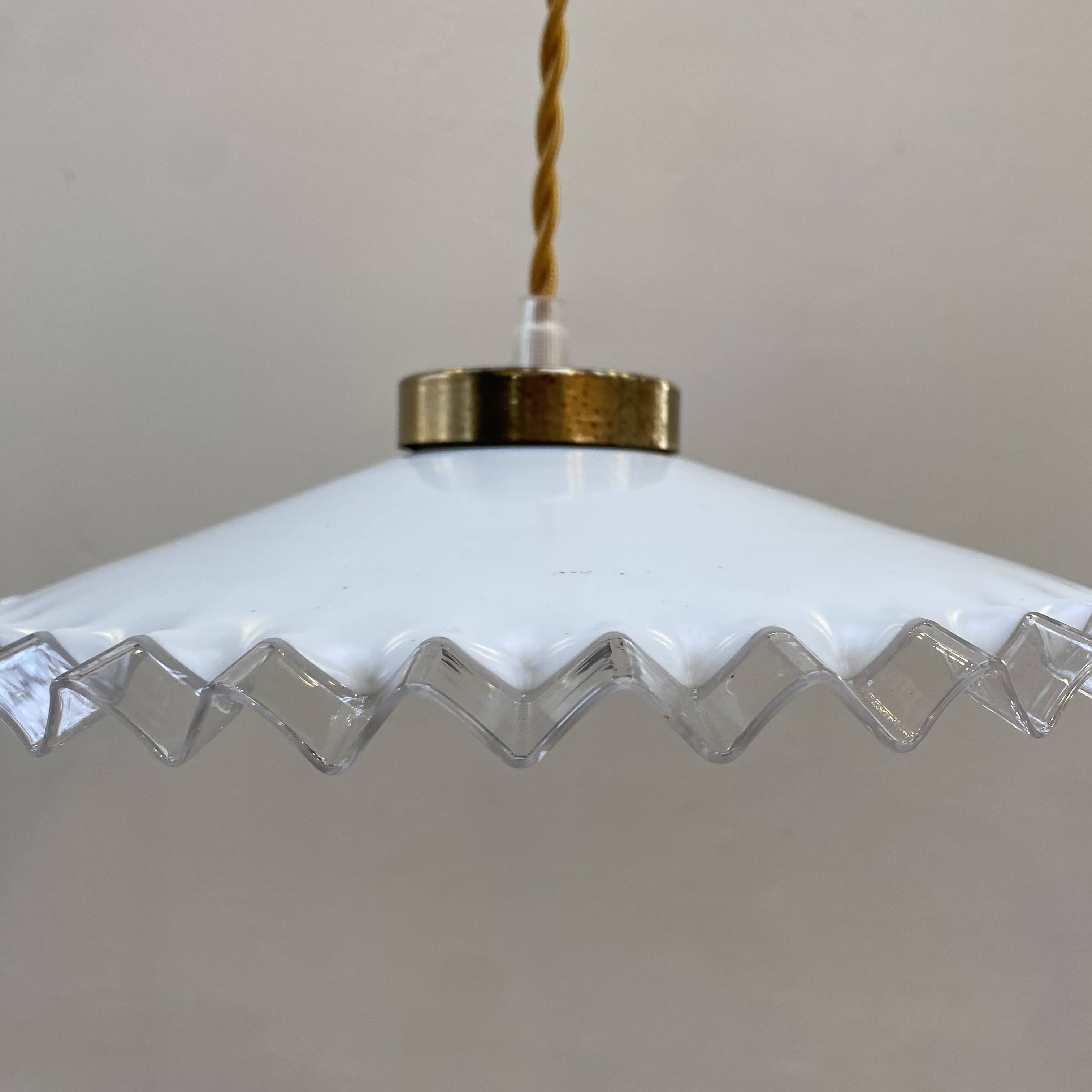 White opaline pendant light with transparent serrated edges