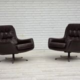 1970s, set of two swivel lounge chairs with footstool, leather.