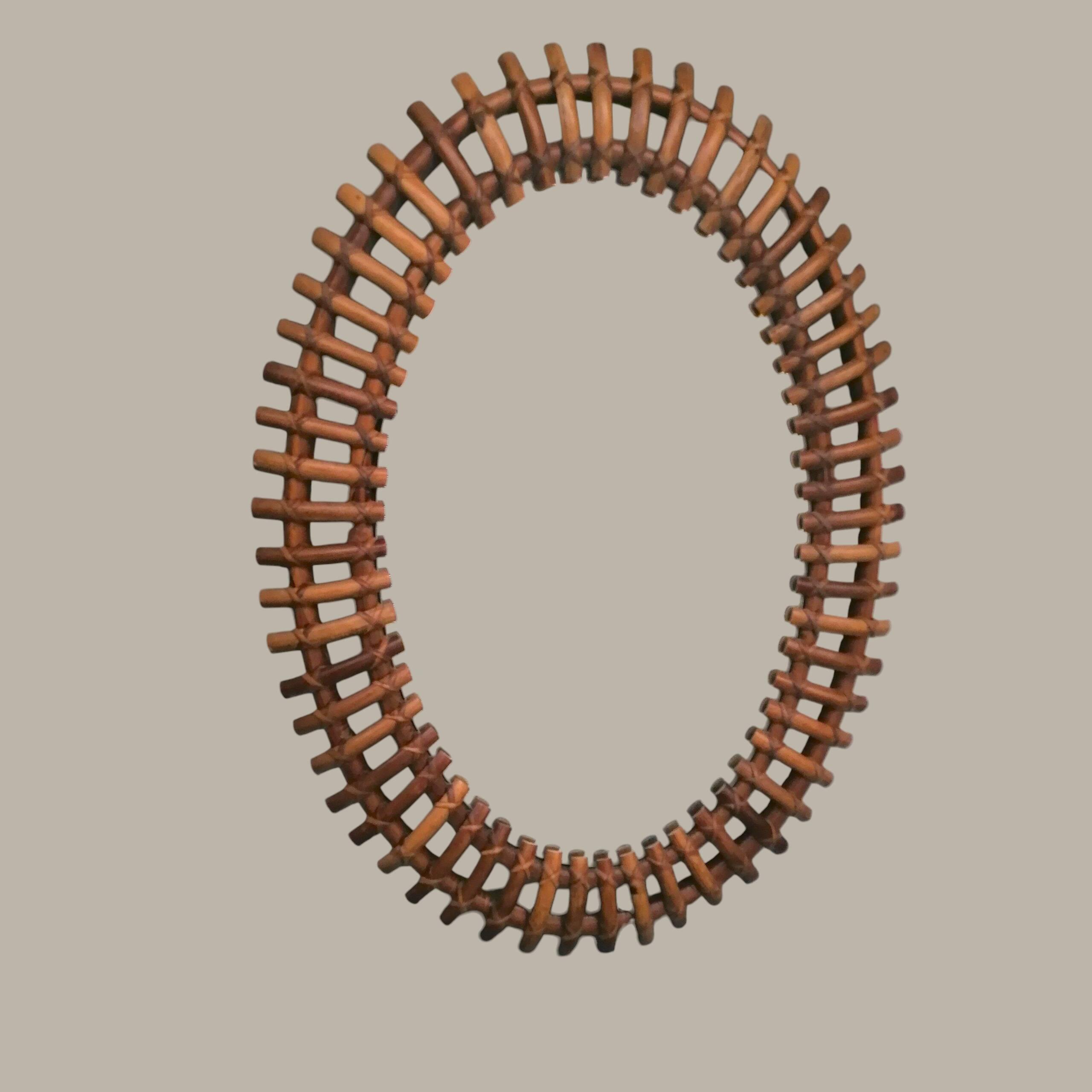 Specchio ovale convesso in bambù di Olaf von Bohr per Bonacina 1960