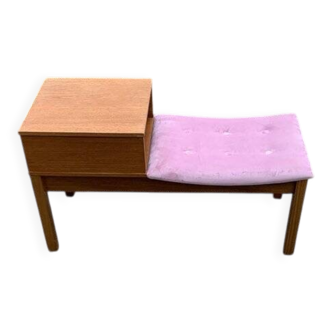 Mid-Century telephone bench in teak with bright pink fabric seat and wooden top.