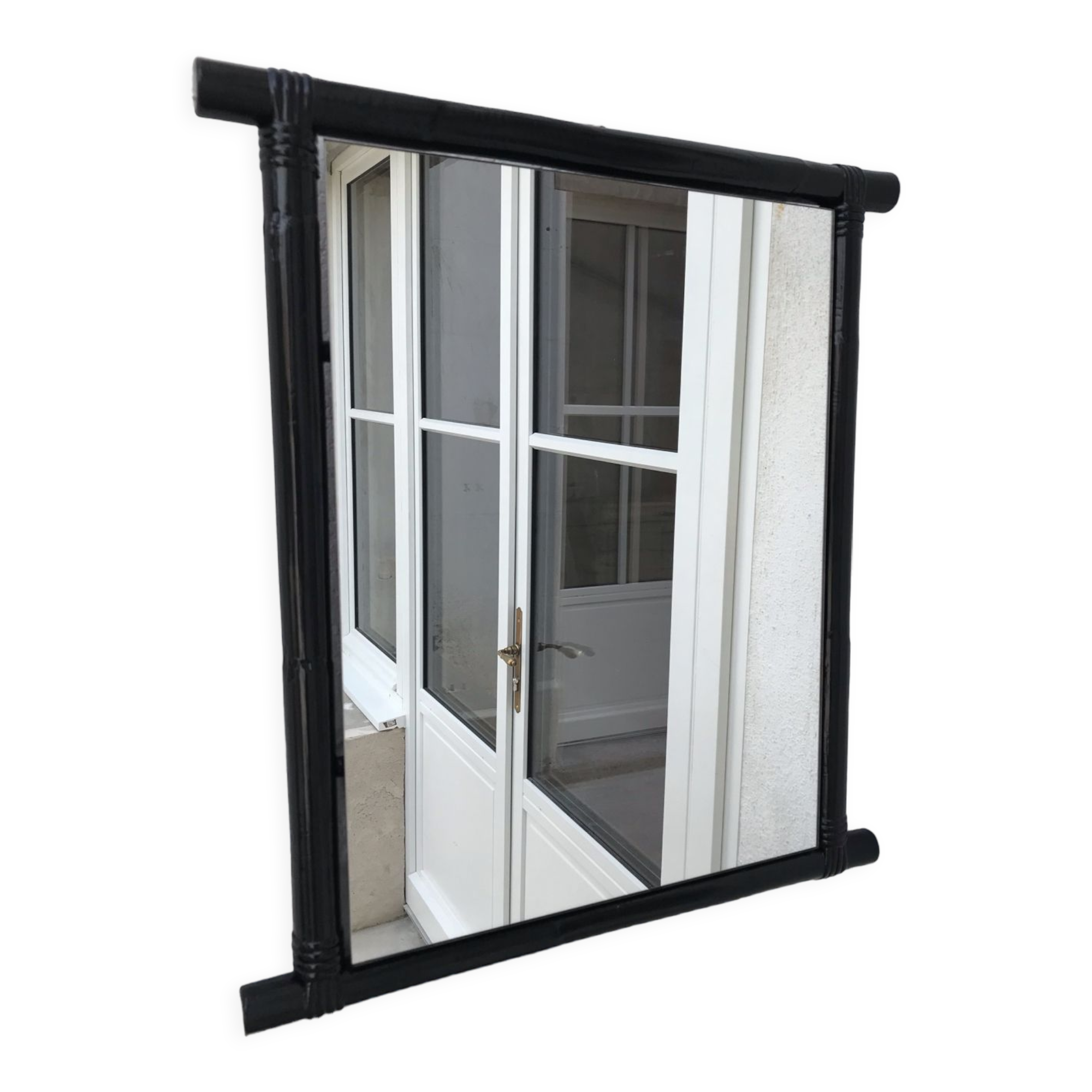 Black lacquered rattan mirror