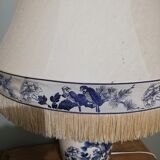 Ceramic lamp with Asian decoration with matching lampshade.