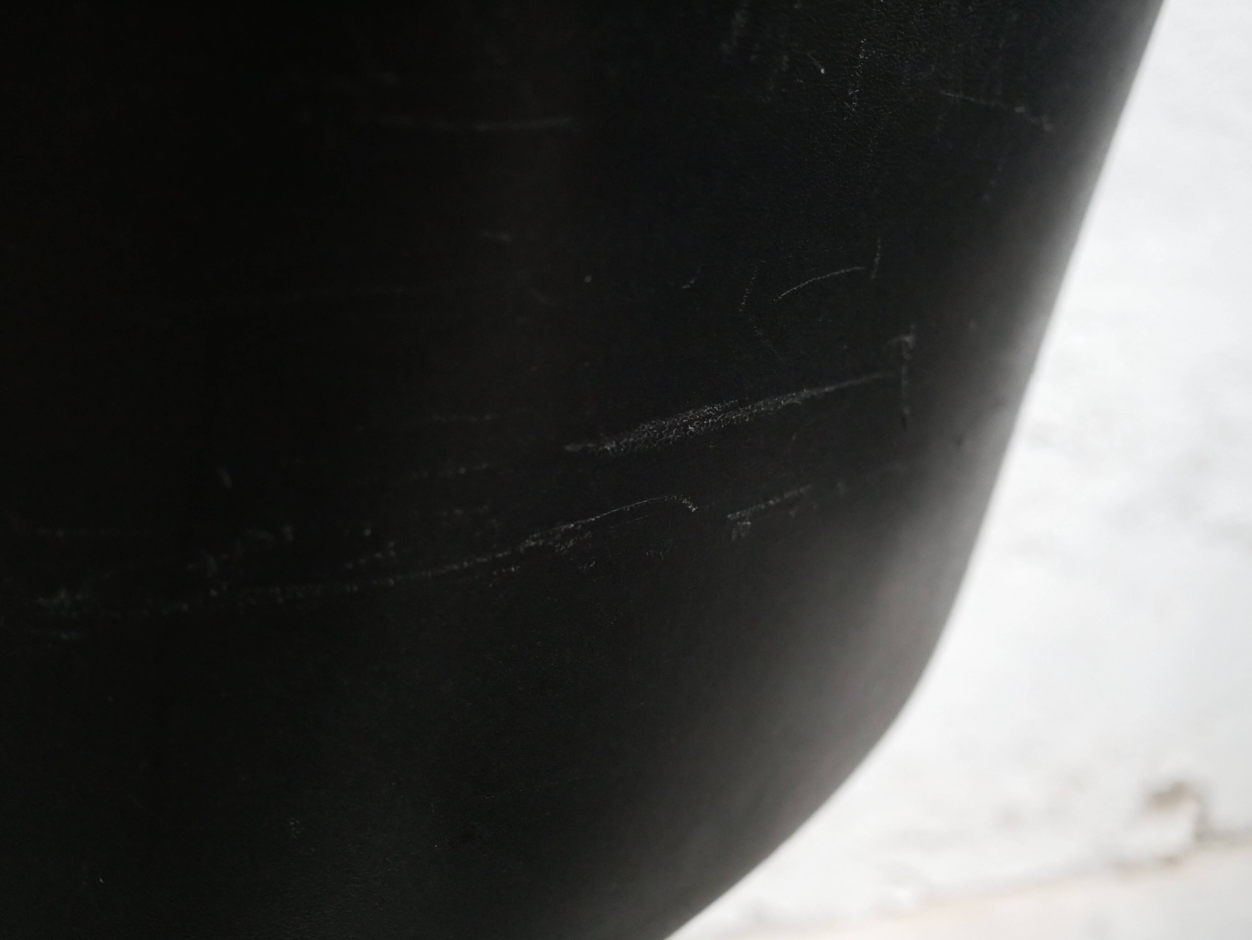 Black leather armchair by Charles Pollock for Knoll International