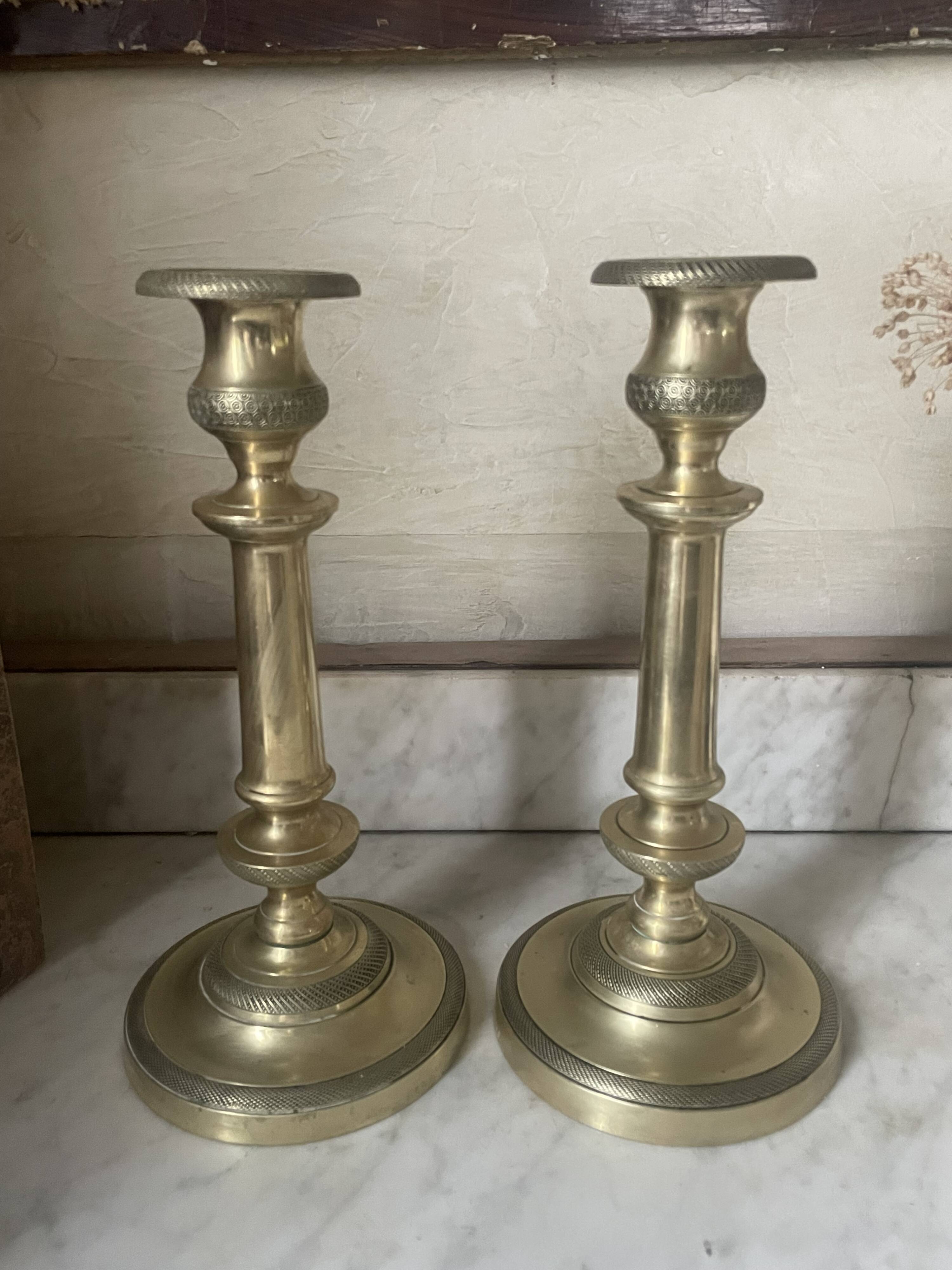 Pair of 19th century guilloche brass candlesticks